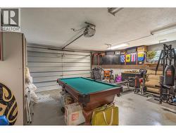 GARAGE - Double Garage with enough room for 2 smaller vehicles, tons of extra storage! Currently used as Man-Cave! -