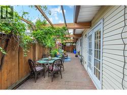 BACK PATIO - Stamped Concrete and lots of quiet, private space off the kitchen/dining room! -