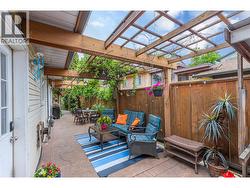 BACK PATIO - Stamped Concrete and lots of quiet, private space off the kitchen/dining room! -