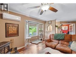 LIVING ROOM - Efficient Heat Pump based ductless-split provides heating & cooling! -