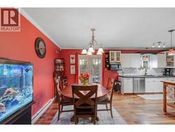 DINING ROOM - With nice chandelier and french doors to patio! -