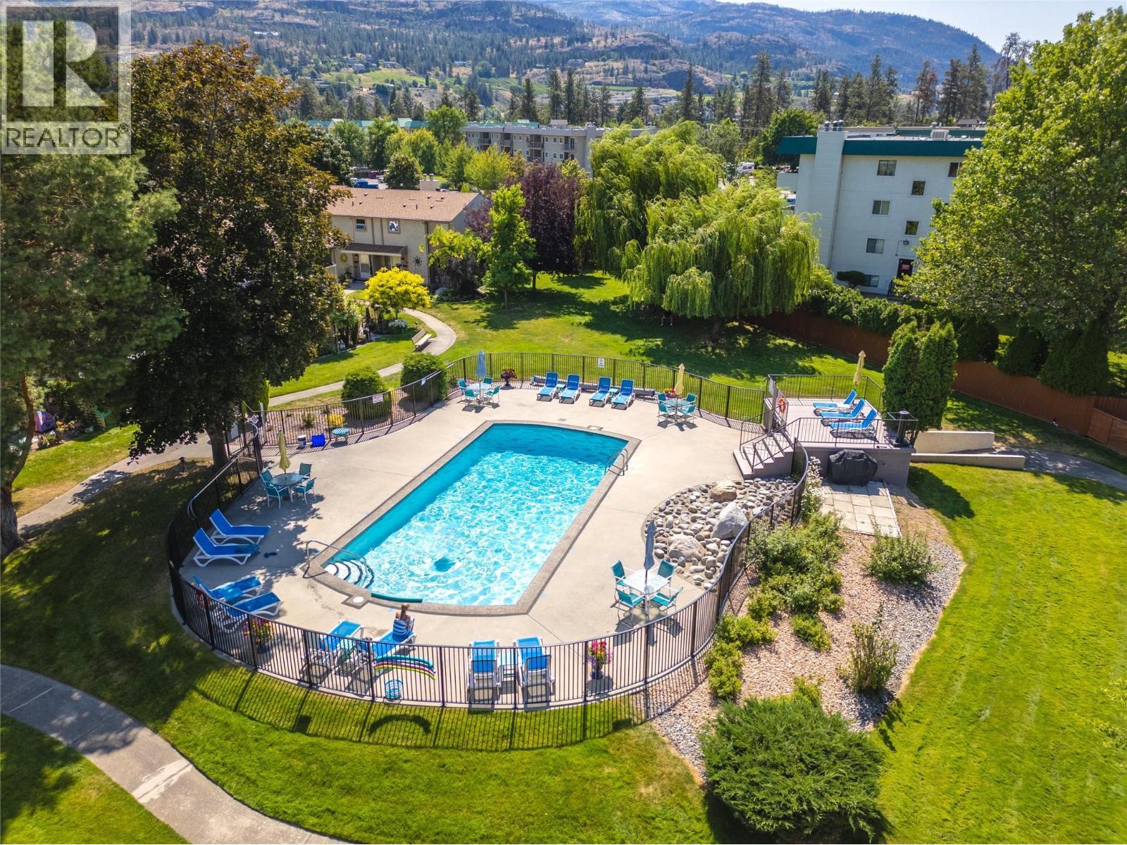 310 Yorkton Avenue Unit# 1, Penticton, BC - Outdoor With In Ground Pool