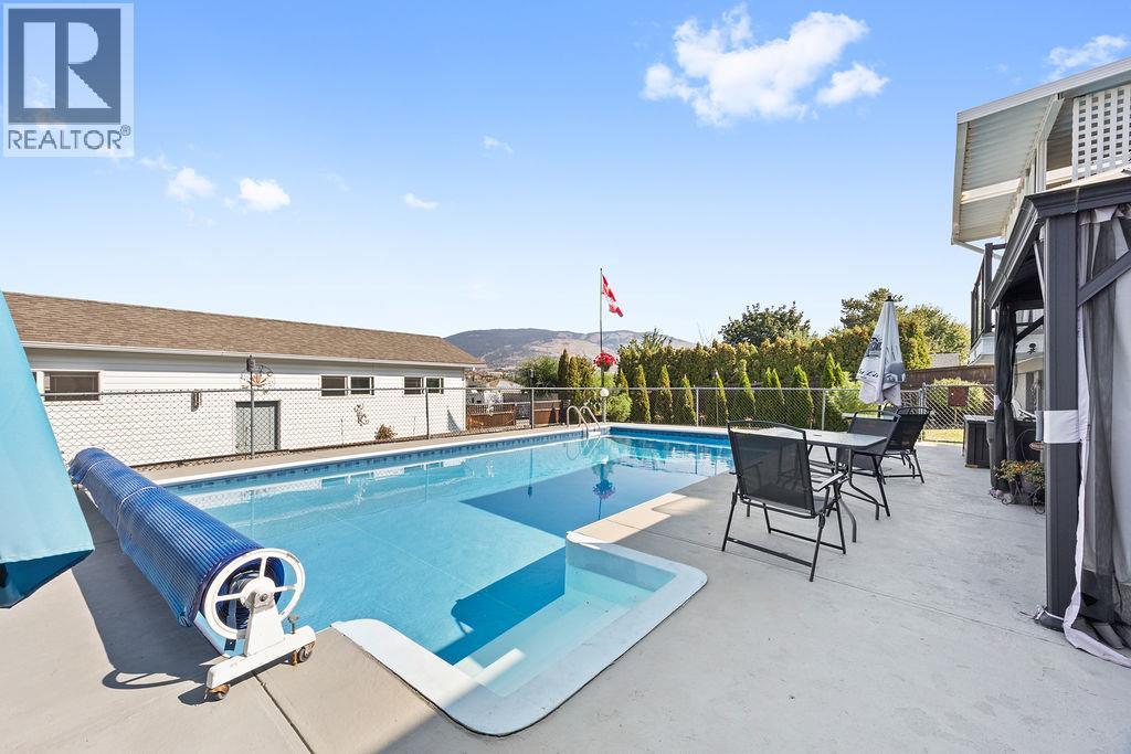 11701 Coldstream Creek Road, Coldstream, BC - Outdoor With In Ground Pool