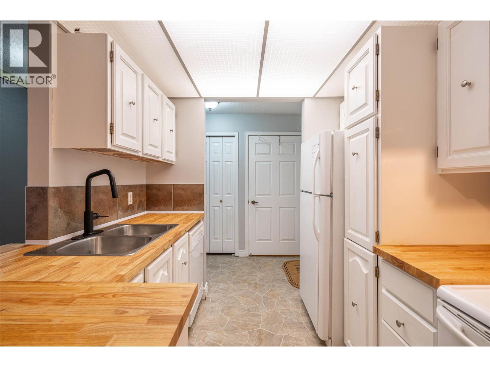 1801 32 Street Unit# 203, Vernon, BC - Indoor Photo Showing Kitchen With Double Sink
