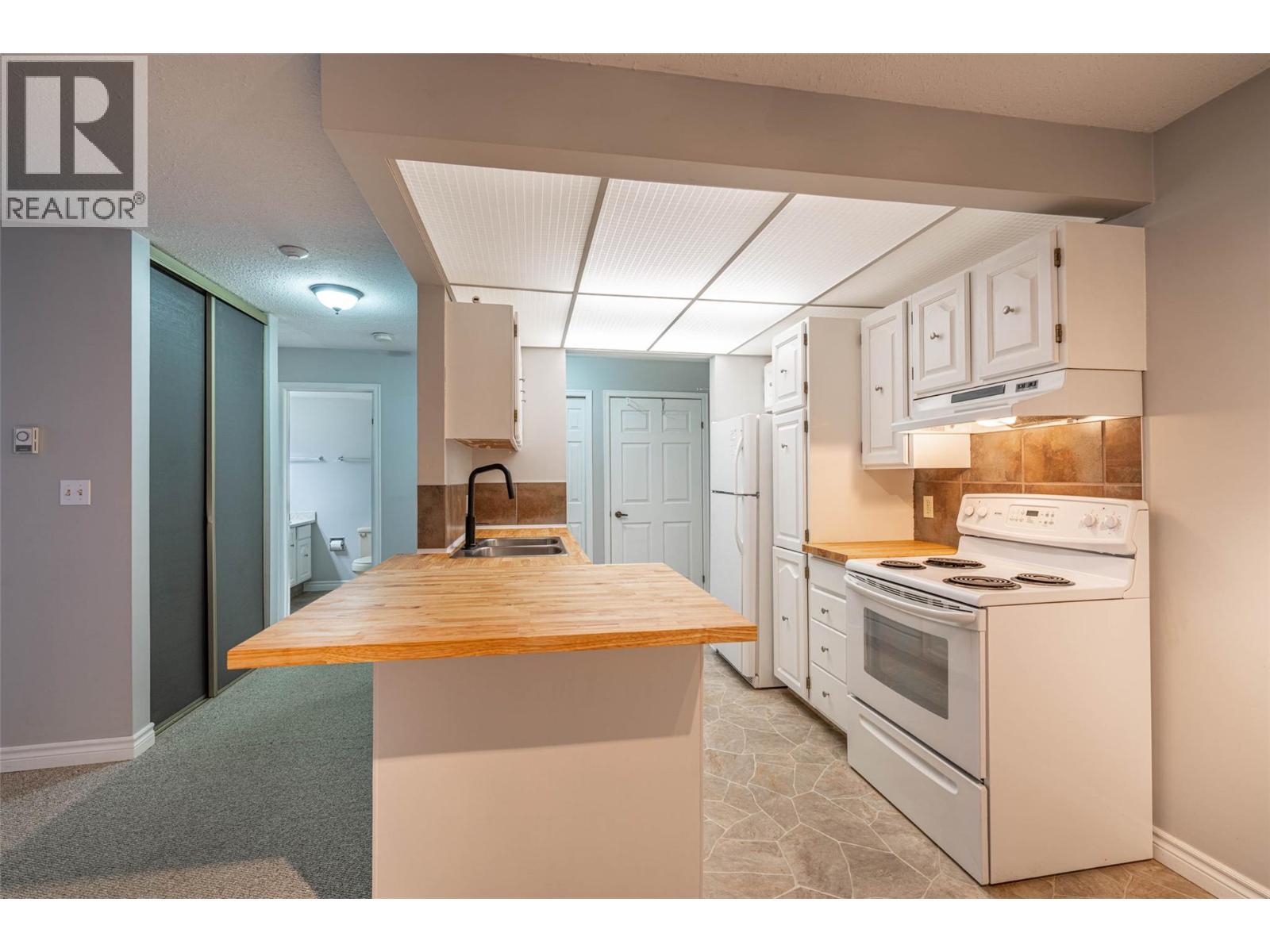 1801 32 Street Unit# 203, Vernon, BC - Indoor Photo Showing Kitchen With Double Sink