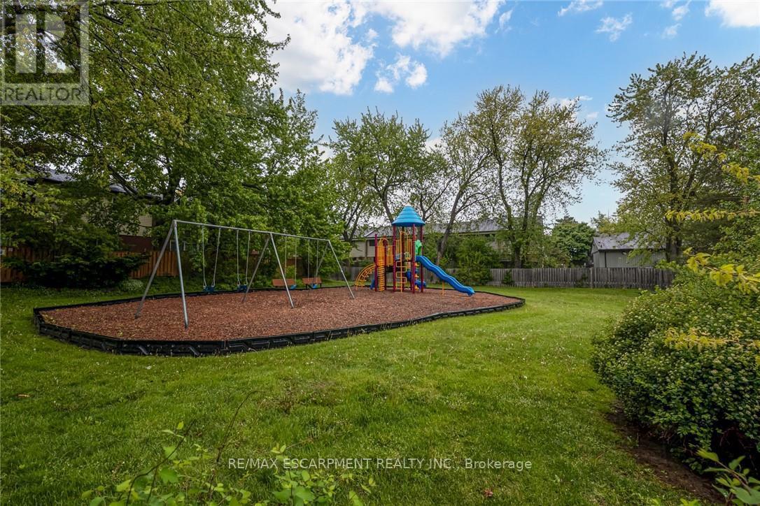 48 - 2825 Gananoque Drive, Mississauga, ON - Outdoor With Backyard