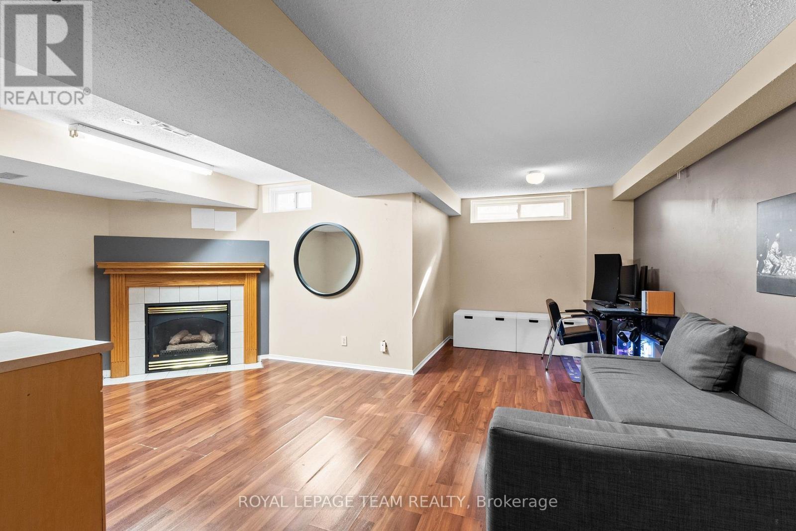 16 Baton Court, Ottawa, ON - Indoor Photo Showing Living Room With Fireplace