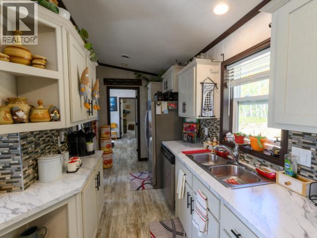 Mile 866 Alaska Highway, Whitehorse, YT - Indoor Photo Showing Kitchen With Double Sink