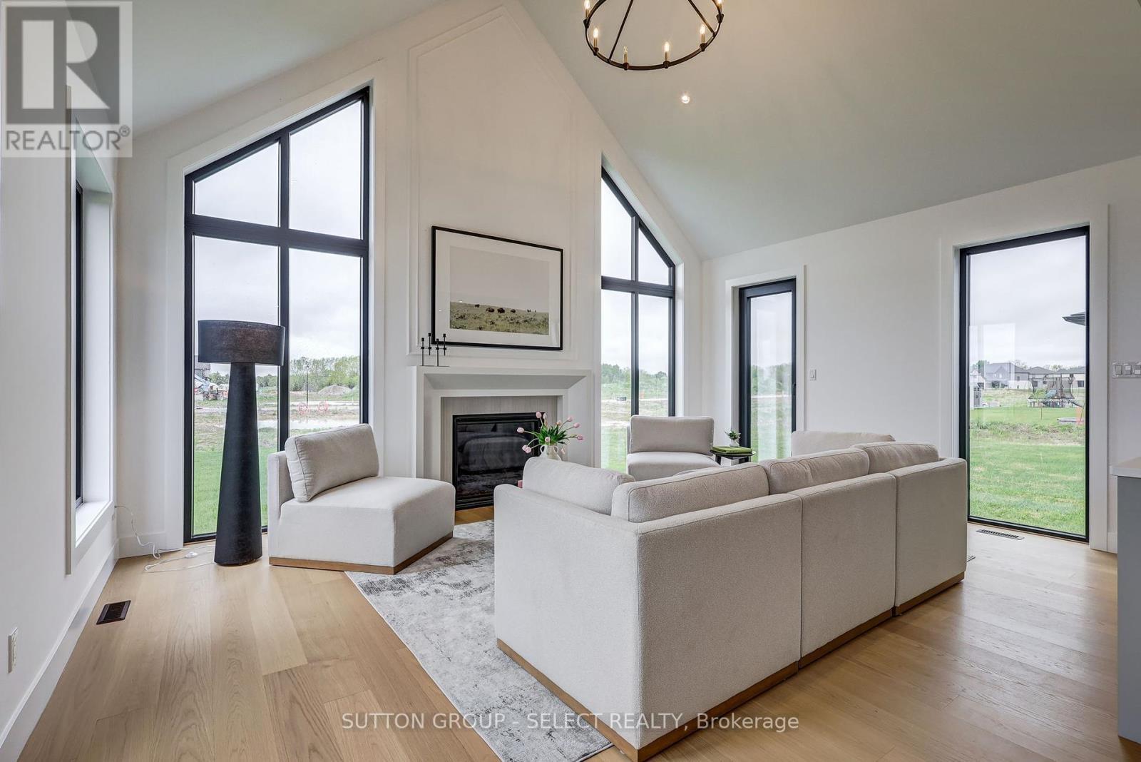 2 Five Stakes Street, Southwold, ON - Indoor Photo Showing Living Room With Fireplace