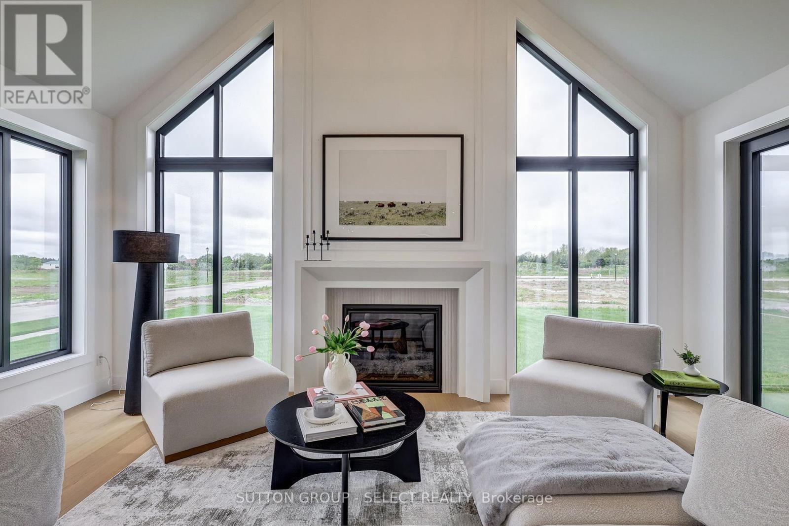 2 Five Stakes Street, Southwold, ON - Indoor Photo Showing Living Room With Fireplace