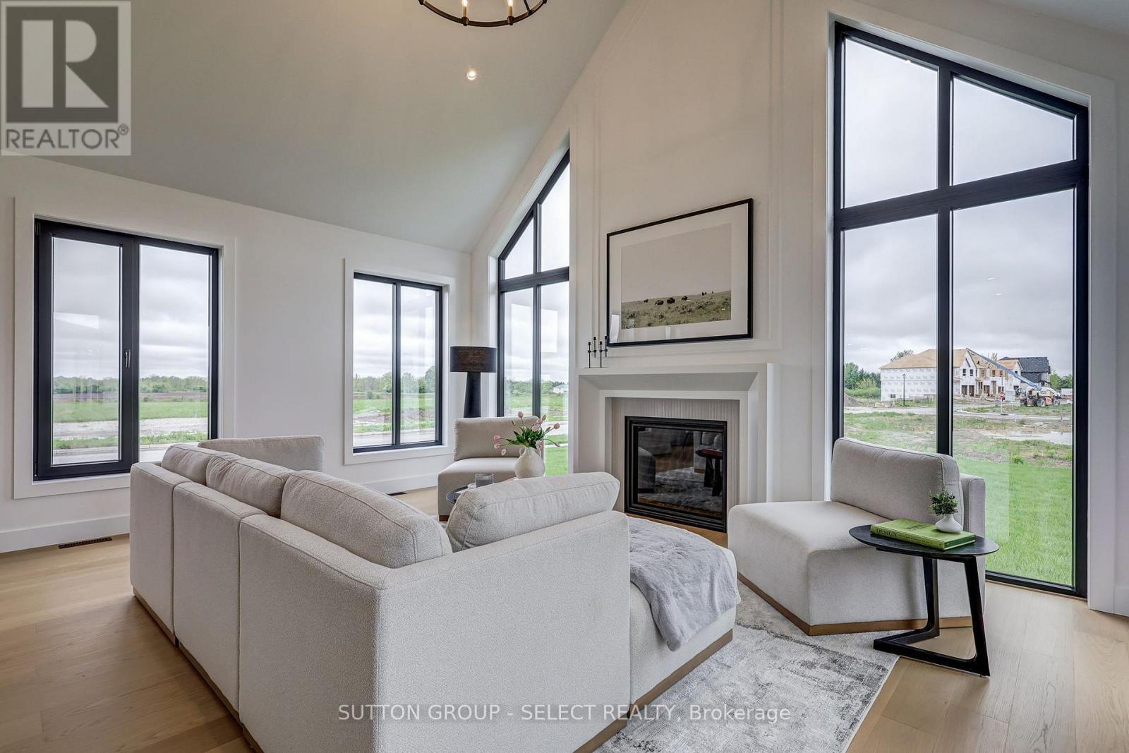 2 Five Stakes Street, Southwold, ON - Indoor Photo Showing Living Room With Fireplace
