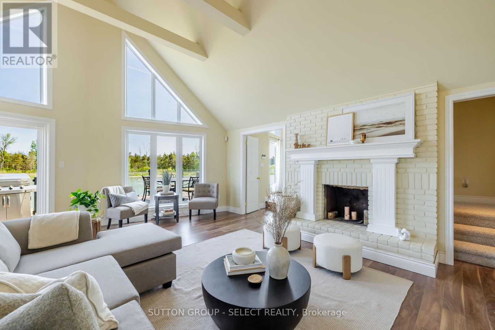7474 Riverside Drive, Lambton Shores (Port Franks), ON - Indoor Photo Showing Living Room With Fireplace