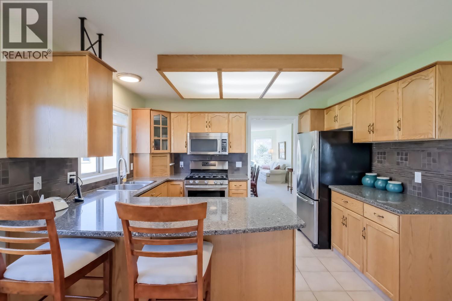 3333 South Main Street Unit# 143, Penticton, BC - Indoor Photo Showing Kitchen With Double Sink