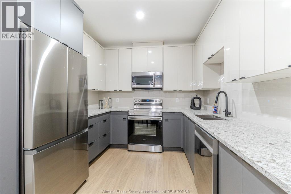 705 Grand Marais Unit# 204, Windsor, ON - Indoor Photo Showing Kitchen With Double Sink With Upgraded Kitchen