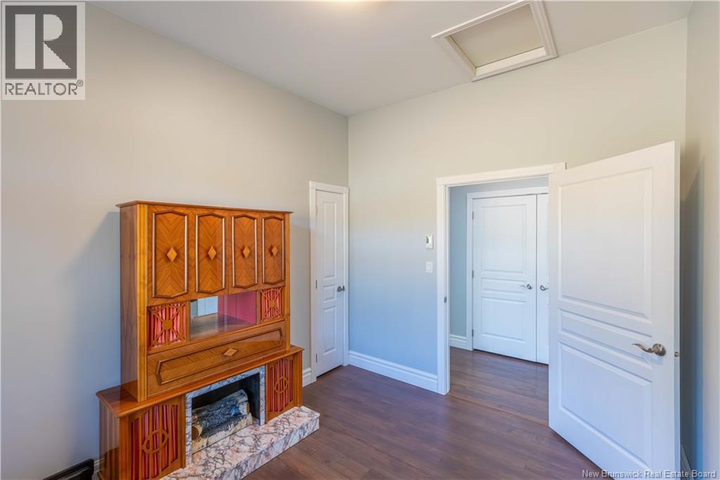 1191 Route 785 Unit# 112, Utopia, NB - Indoor Photo Showing Other Room With Fireplace