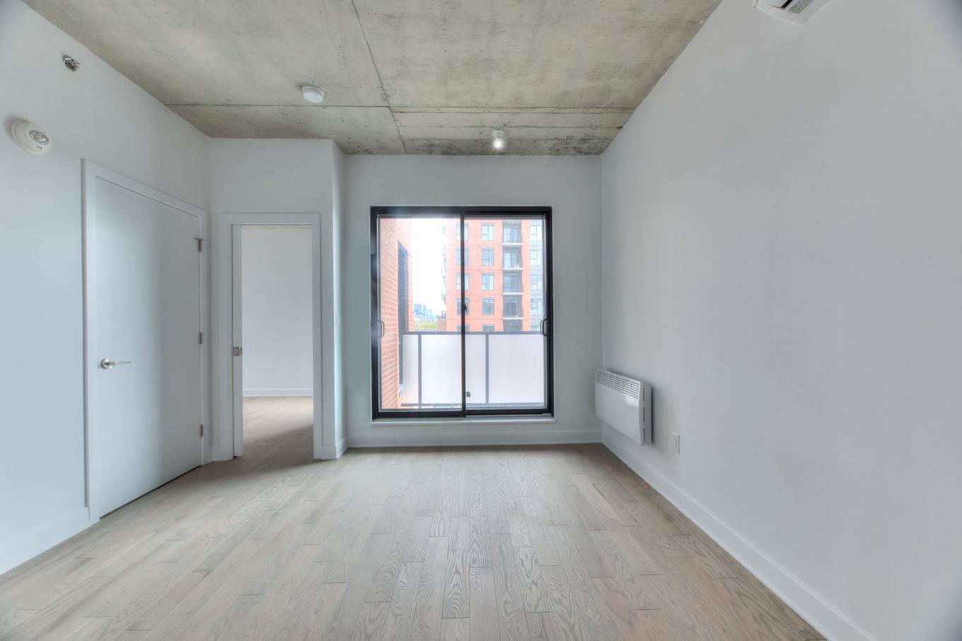 Salon - 306-2660 Rue Ontario E., Montréal (Ville-Marie), QC - Indoor Photo Showing Other Room