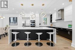 Enjoy a Dramatic Waterfall Island w/Breakfast Bar -