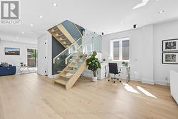 Open-Riser Staircase with Glass Panel -