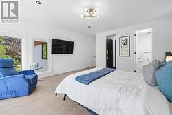 Primary Bedroom Offers a Walk-In Closet -