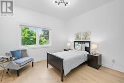 Second Bedroom with Engineered Hardwood Flooring -