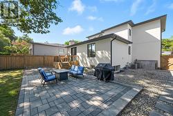 Custom Deck & Stone Patio Perfect for Entertaining -