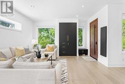 Living Room with Engineered Hardwood Flooring -