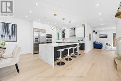 Dream Kitchen Features a Dramatic Waterfall Island -