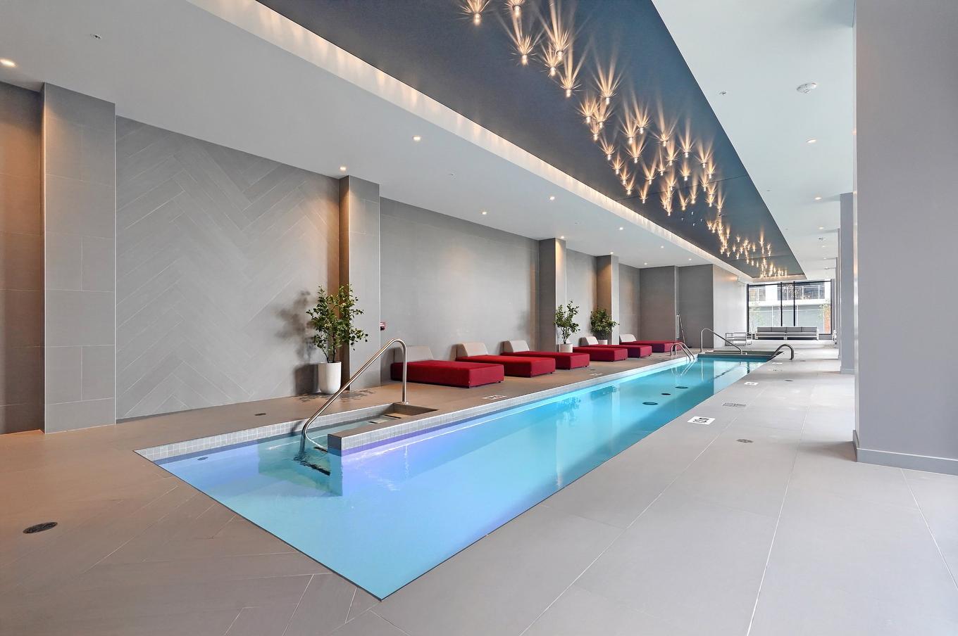 Pool - 1008-5905 Boul. Du Quartier, Brossard, QC - Indoor Photo Showing Other Room With In Ground Pool