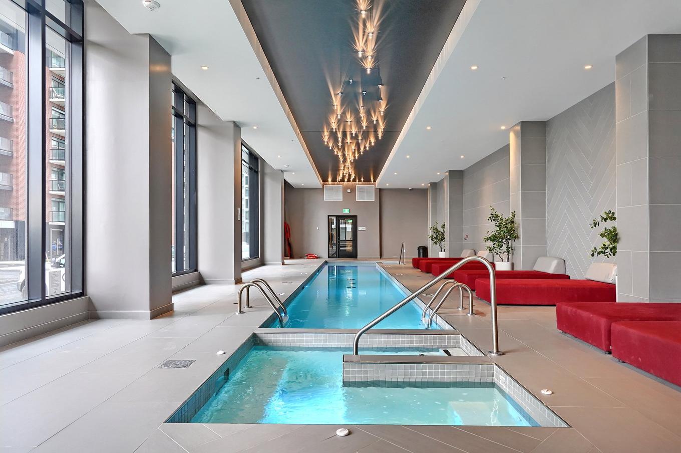 Pool - 1008-5905 Boul. Du Quartier, Brossard, QC - Indoor Photo Showing Other Room With In Ground Pool