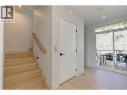 Stairs, elevator and back deck kitchen level - Level 3 -