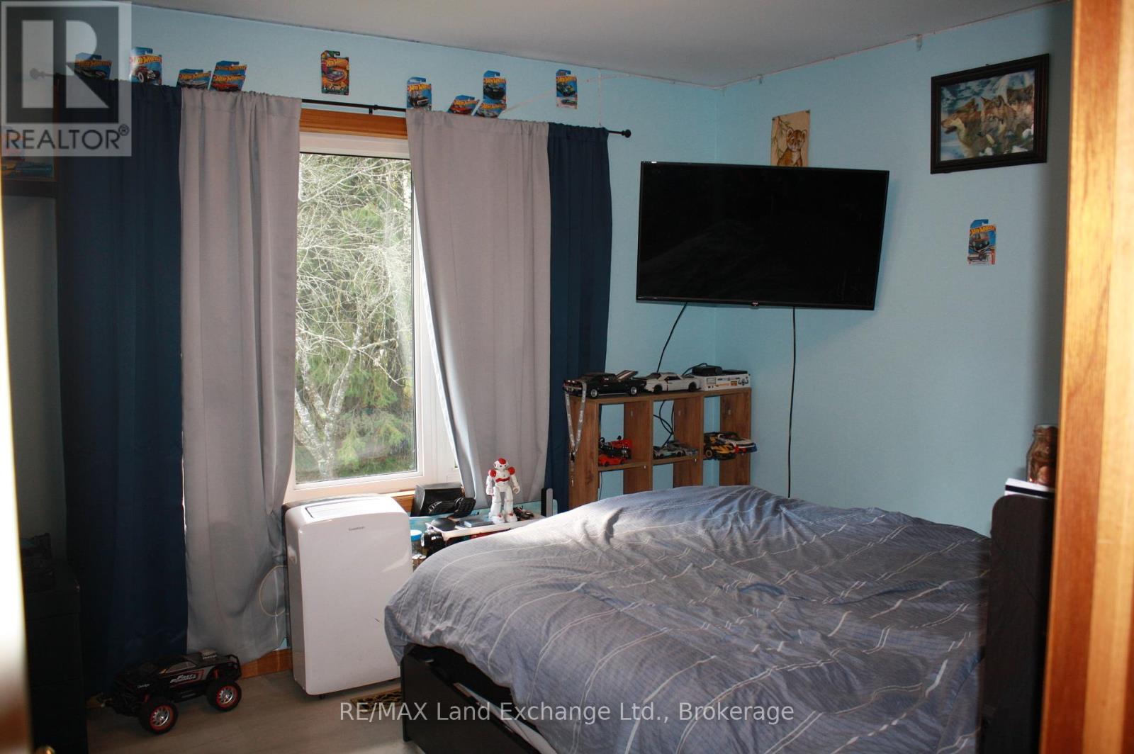 main floor bedroom - 315045 Highway 6 Rr1 Highway, West Grey, ON - Indoor Photo Showing Bedroom