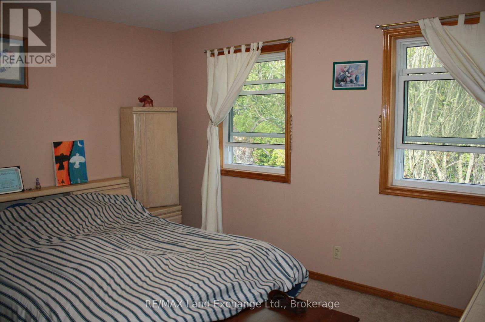 main floor bedroom - 315045 Highway 6 Rr1 Highway, West Grey, ON - Indoor Photo Showing Bedroom