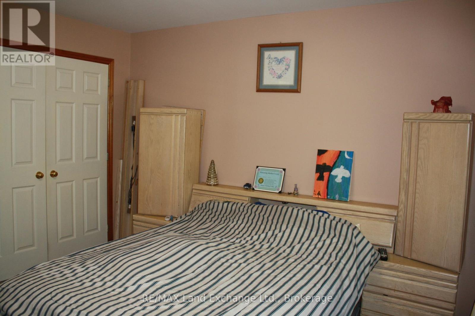 main flr bed - 315045 Highway 6 Rr1 Highway, West Grey, ON - Indoor Photo Showing Bedroom