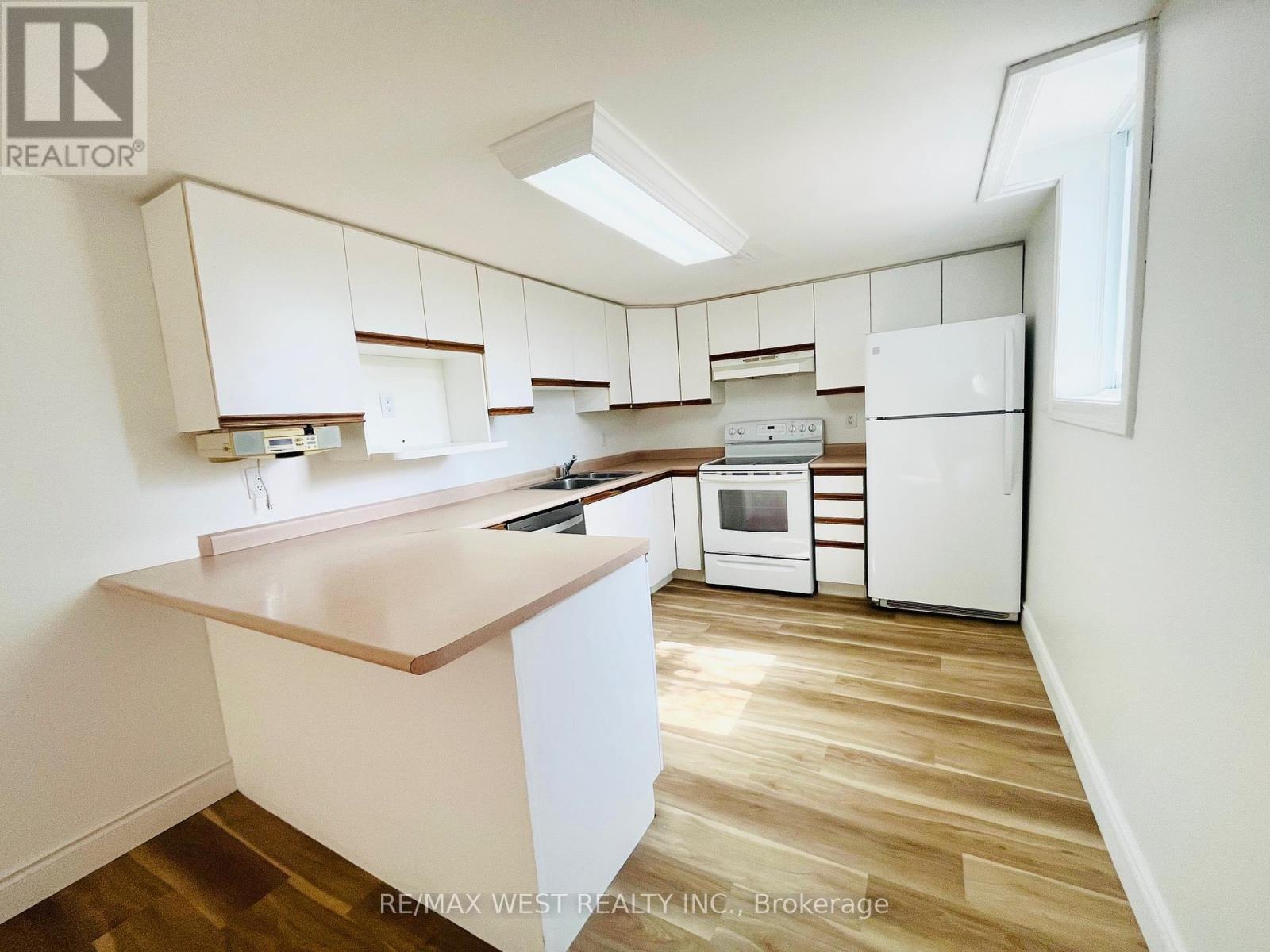 Basement - 63 Taylorwood Road, Oshawa, ON - Indoor Photo Showing Kitchen With Double Sink