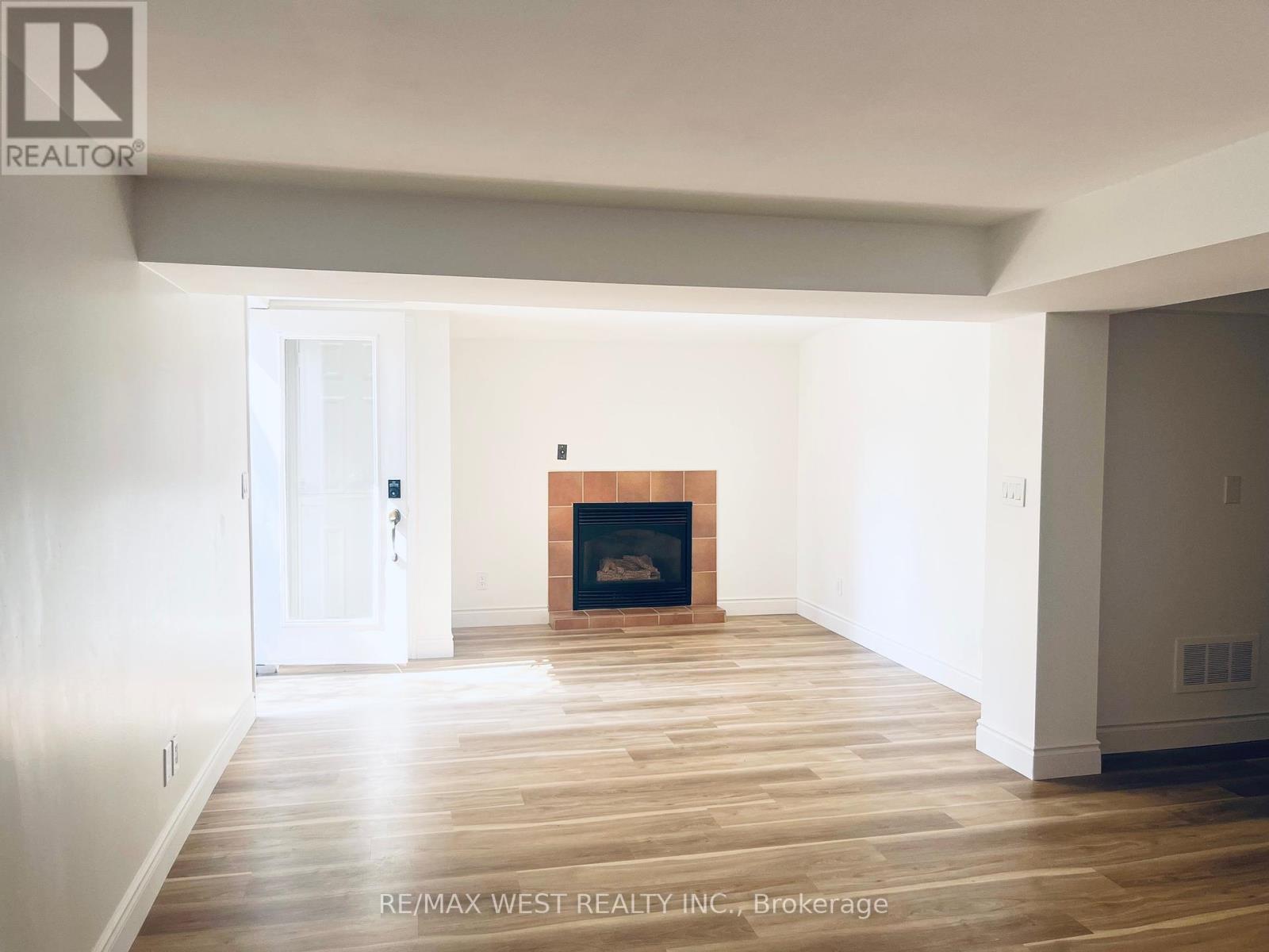 Basement - 63 Taylorwood Road, Oshawa, ON - Indoor Photo Showing Other Room With Fireplace