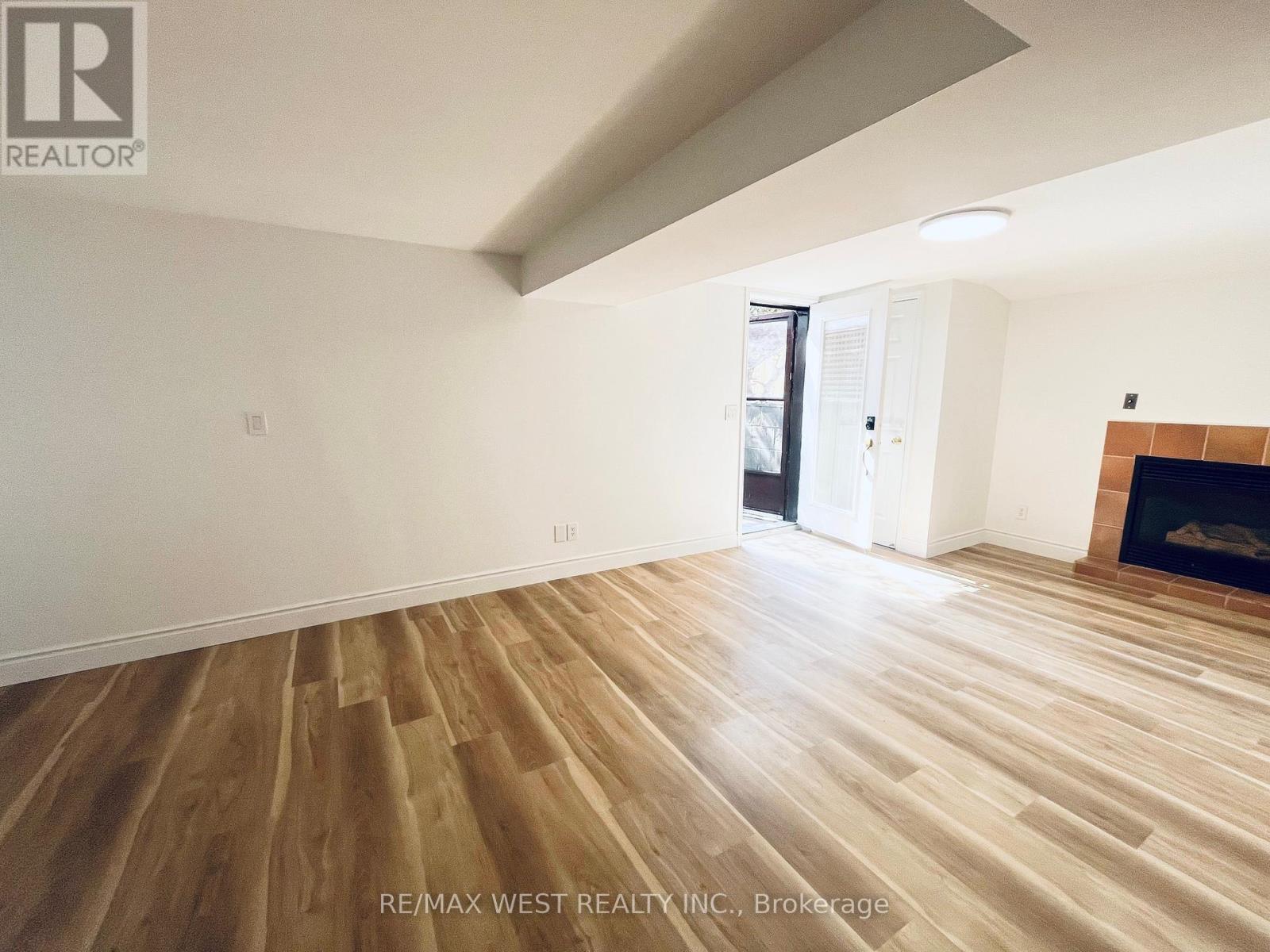 Basement - 63 Taylorwood Road, Oshawa, ON - Indoor Photo Showing Other Room With Fireplace