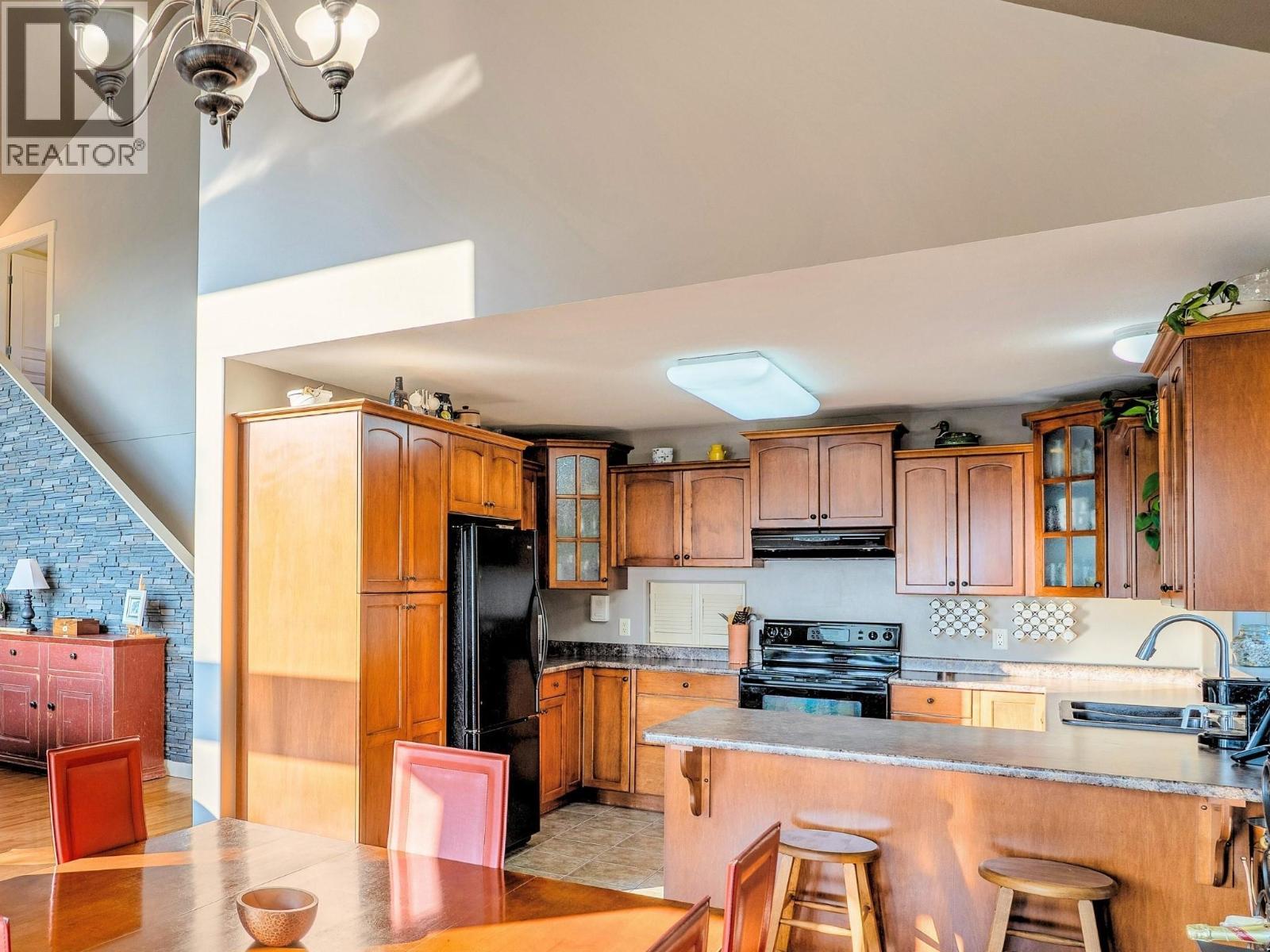 8130 Jackpine Road, Vernon, BC - Indoor Photo Showing Kitchen With Double Sink