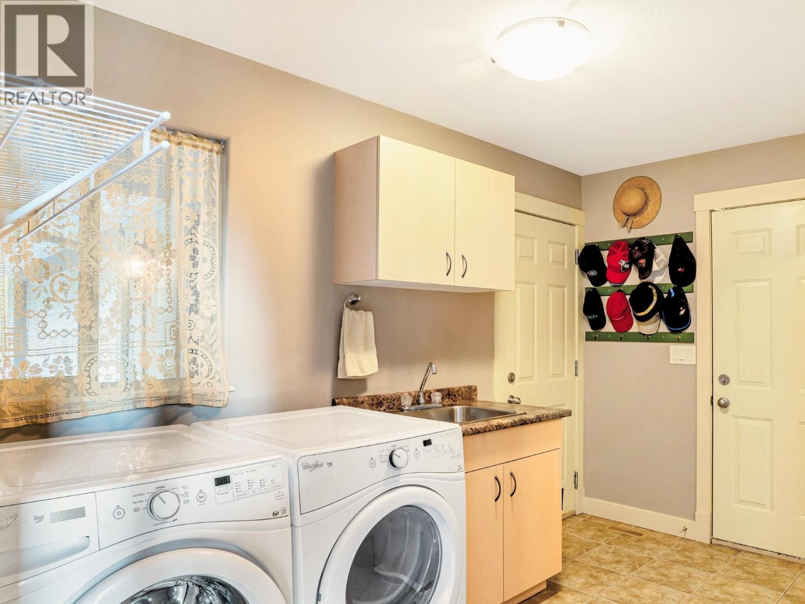 8130 Jackpine Road, Vernon, BC - Indoor Photo Showing Laundry Room