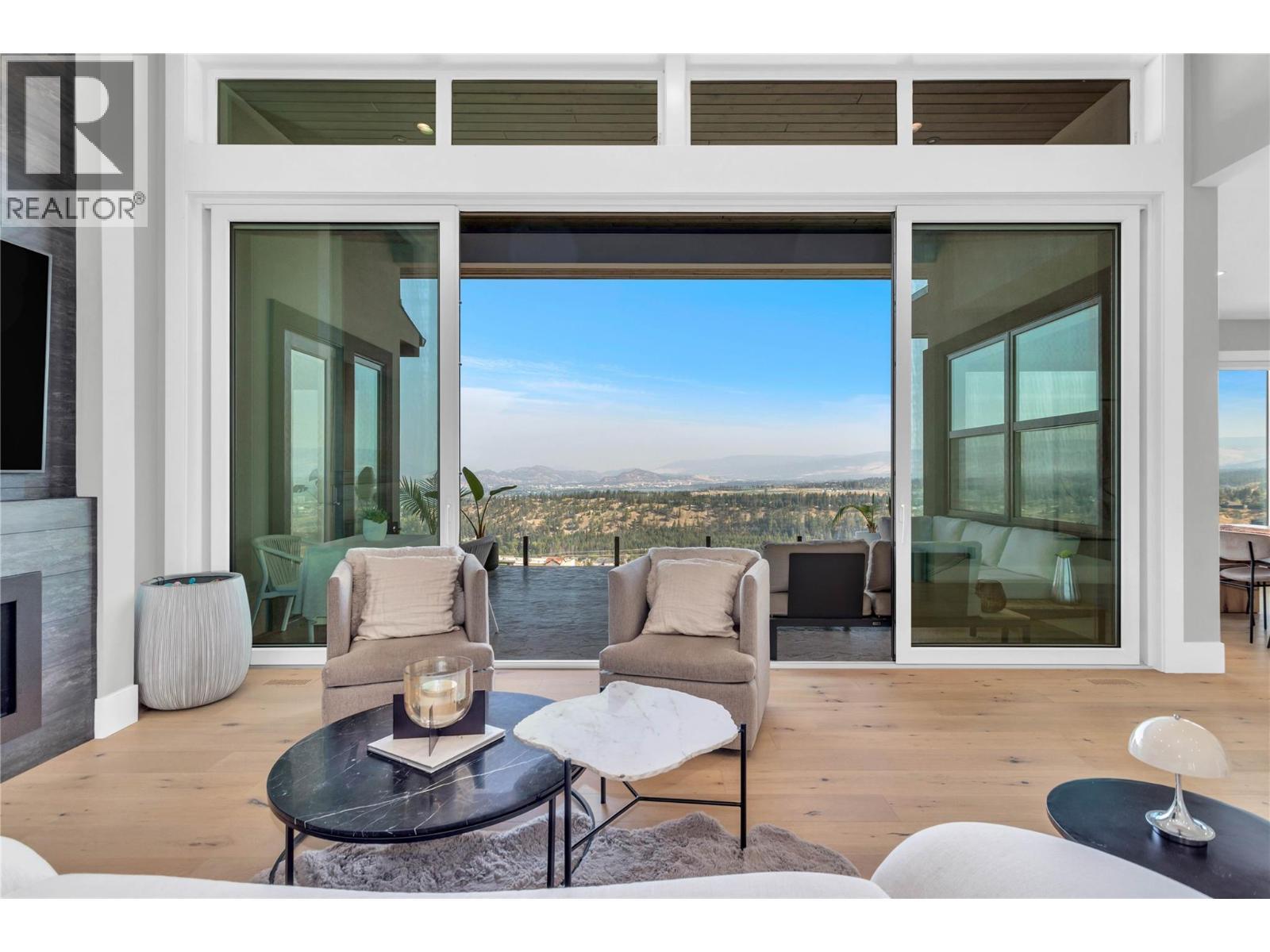 1050 Ledgeview Court, Kelowna, BC - Photo Showing Living Room With Fireplace