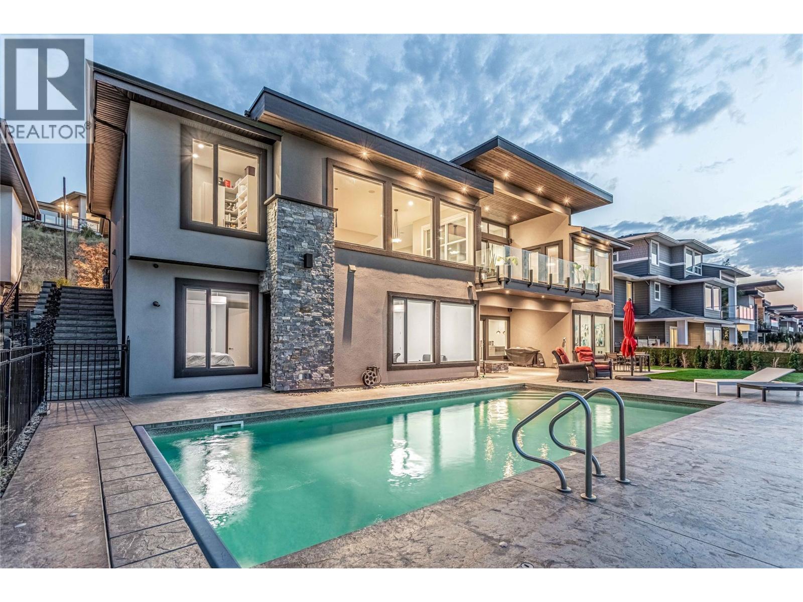 1050 Ledgeview Court, Kelowna, BC - Outdoor With In Ground Pool