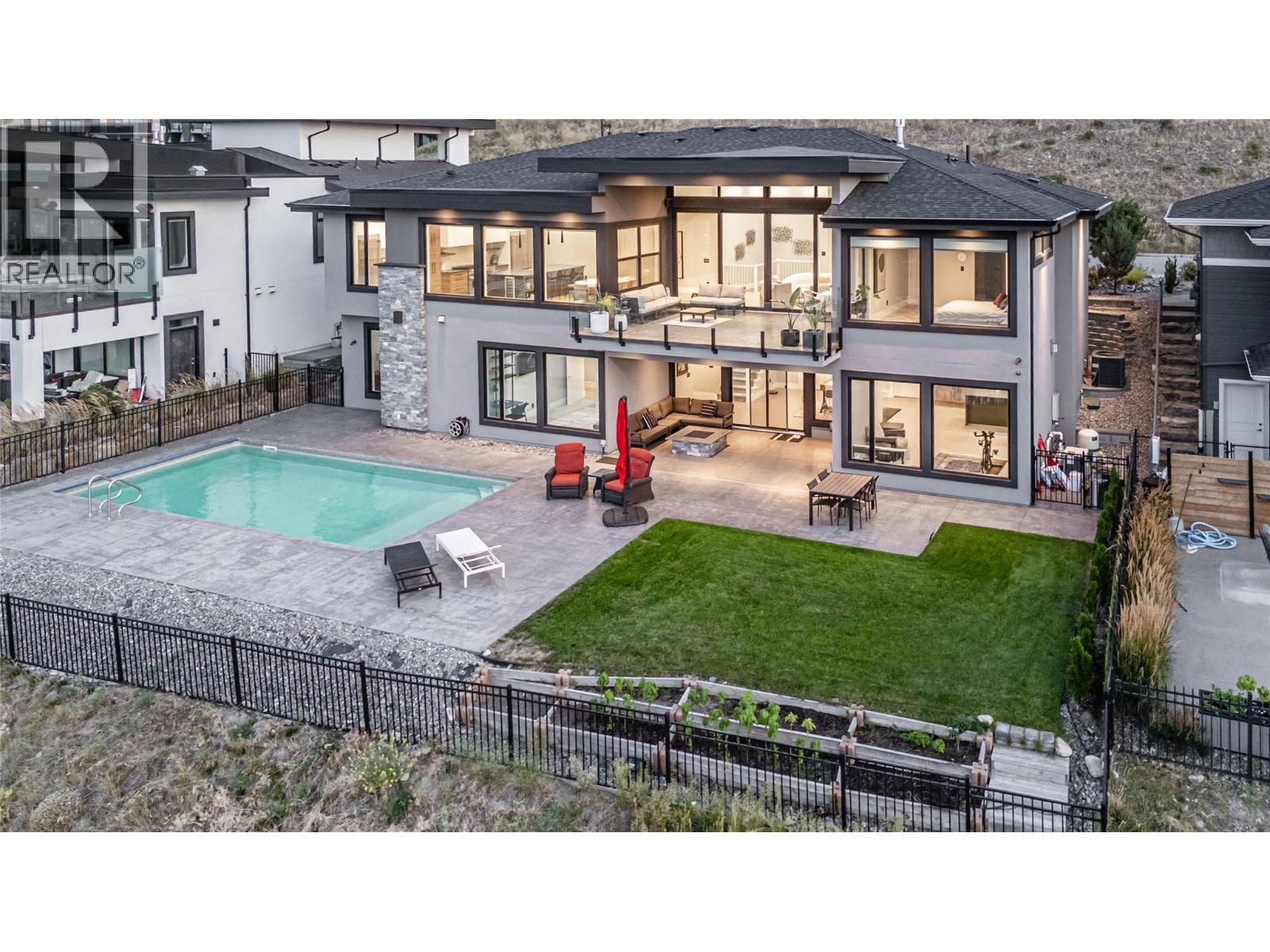 1050 Ledgeview Court, Kelowna, BC - Outdoor With In Ground Pool