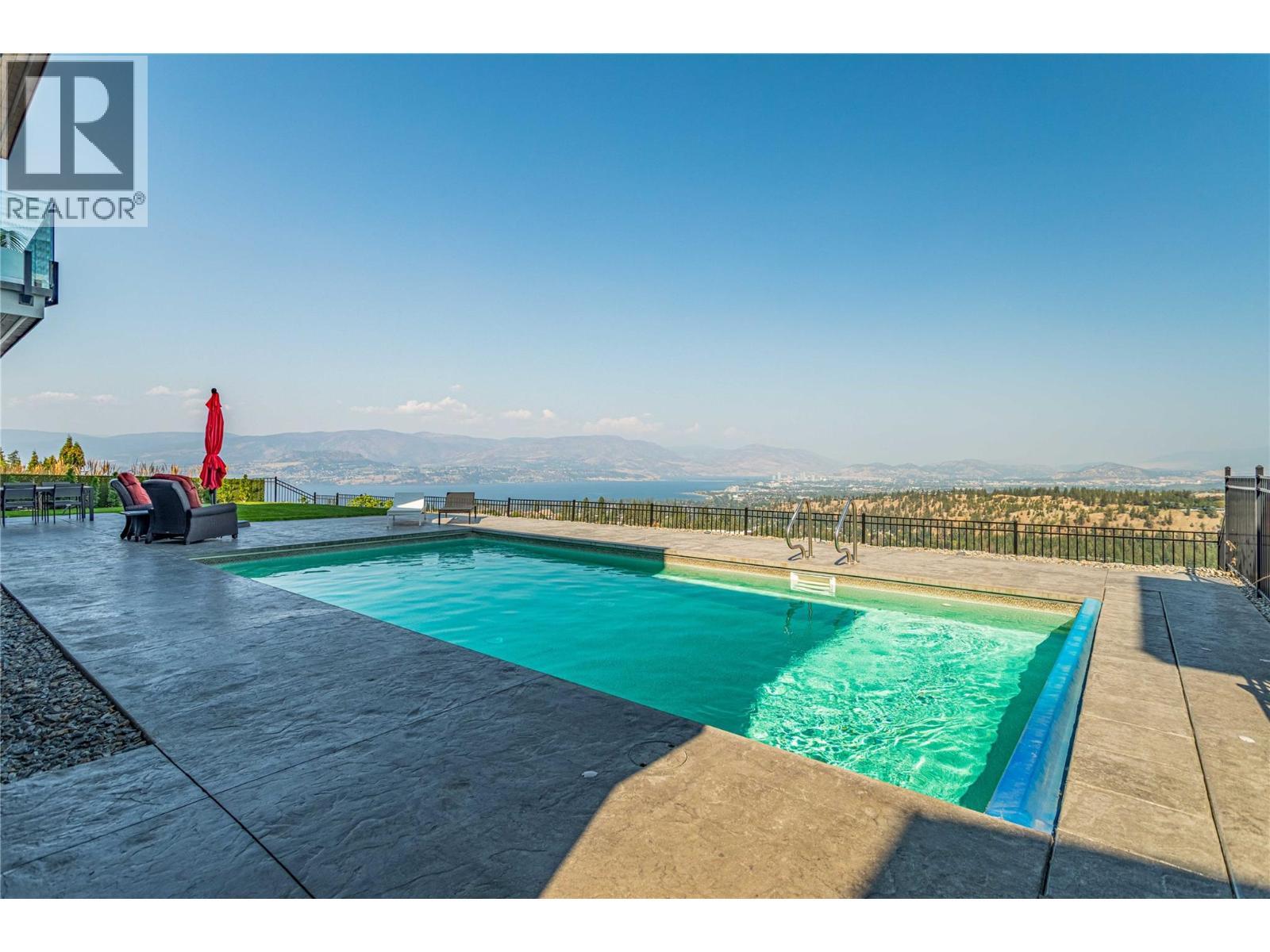 1050 Ledgeview Court, Kelowna, BC - Outdoor With In Ground Pool With View