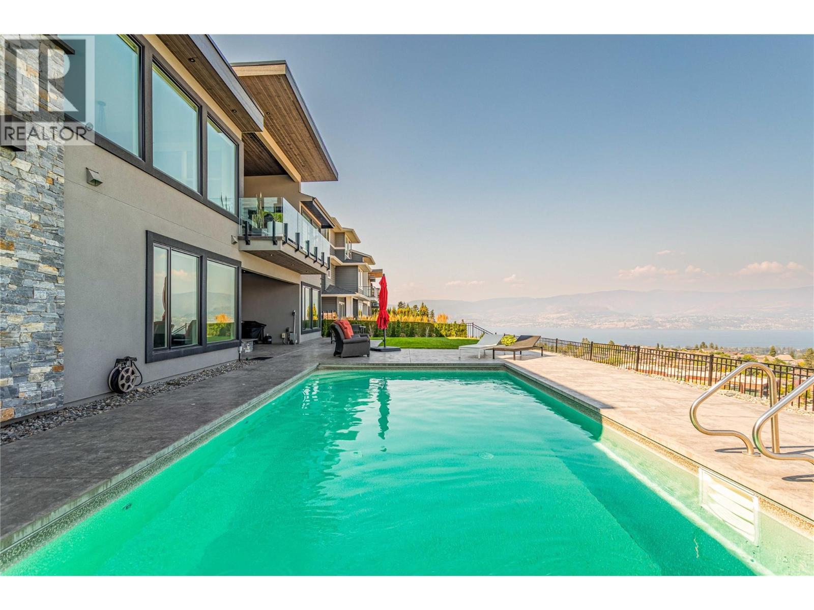 1050 Ledgeview Court, Kelowna, BC - Outdoor With In Ground Pool