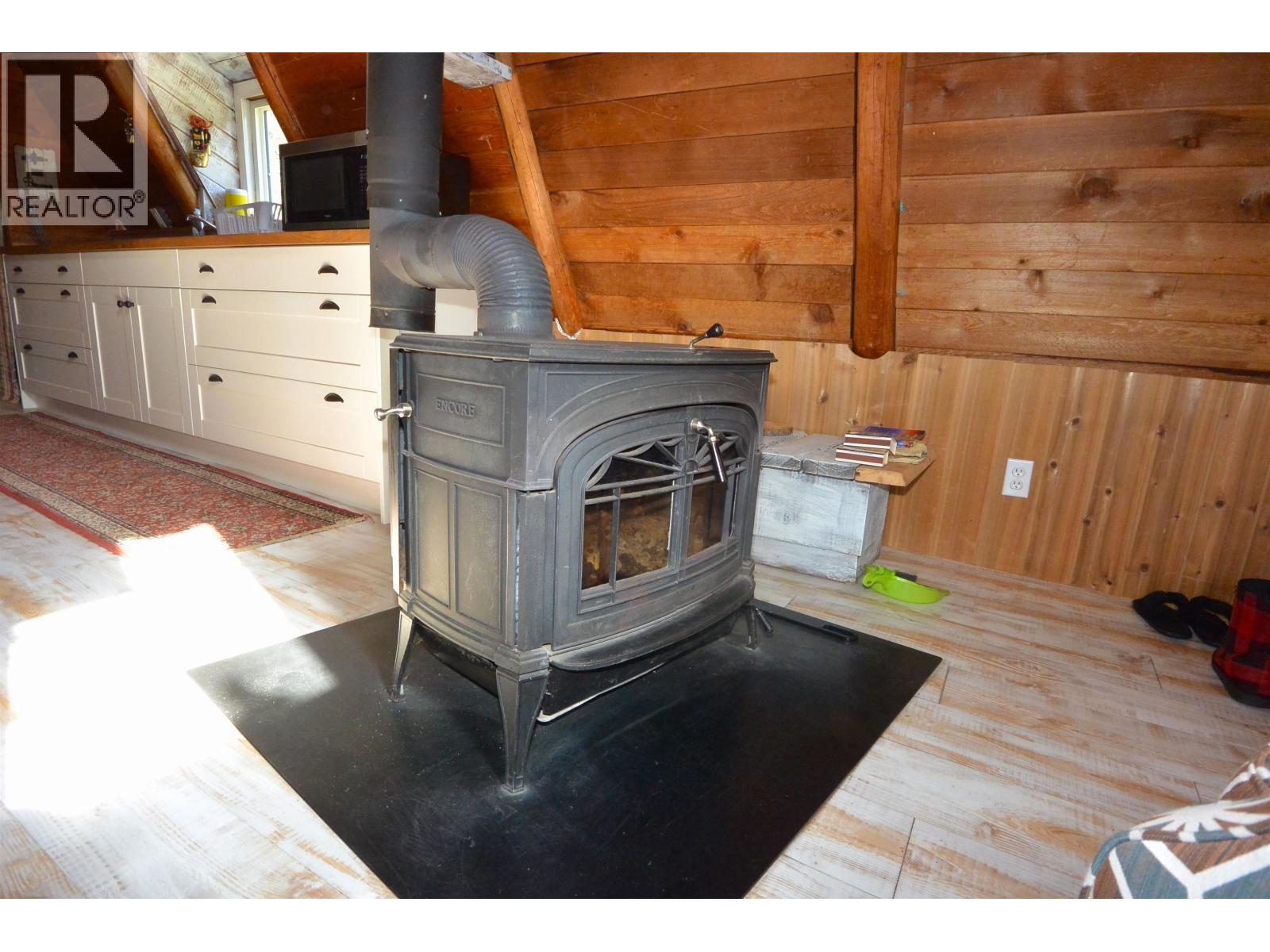 28062 Walcott Quick Road, Telkwa, BC - Indoor With Fireplace