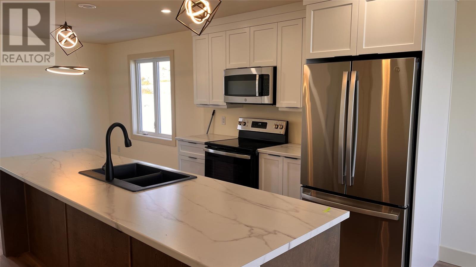 94 Island Cove Road, Bay Bulls, NL - Indoor Photo Showing Kitchen With Double Sink