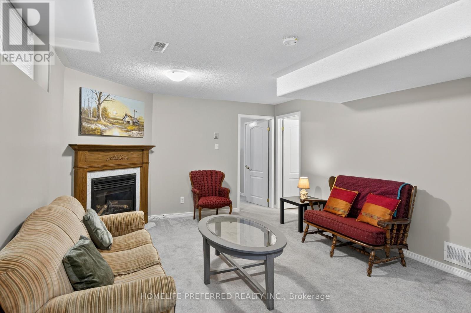 955 Ralphson Crescent, Peterborough (Otonabee Ward 1), ON - Indoor Photo Showing Living Room With Fireplace