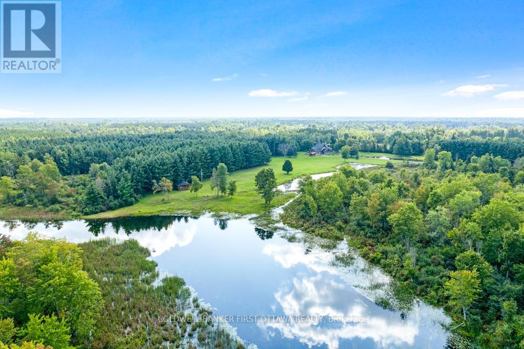 Tranquil park-like 92 acres on the Tay River - 2499 Bathurst Concession 2 Road, Tay Valley, ON - Outdoor With Body Of Water With View