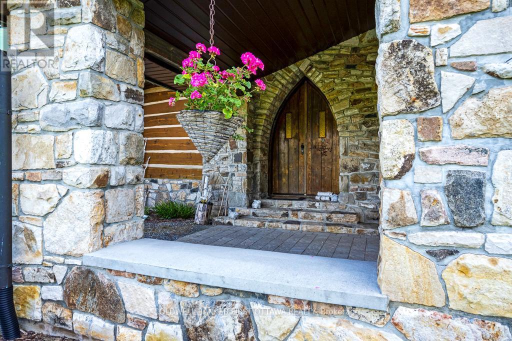 Endearing gothic solid wood front door - 2499 Bathurst Concession 2 Road, Tay Valley, ON - Outdoor