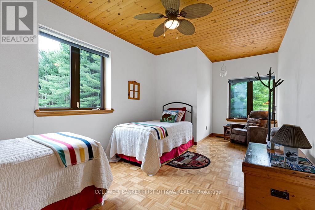Main floor bedroom - 2499 Bathurst Concession 2 Road, Tay Valley, ON - Indoor Photo Showing Bedroom