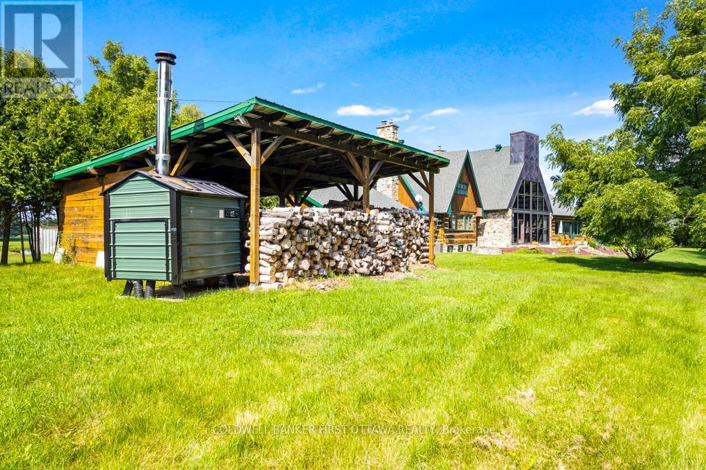 Woodshed and outside oil-wood burning furnace - 2499 Bathurst Concession 2 Road, Tay Valley, ON - Outdoor